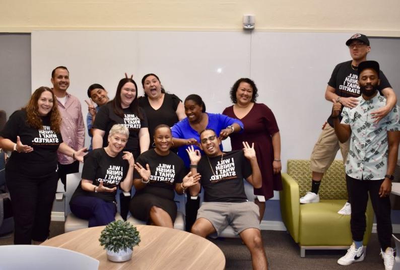 Students from the Organizational Leadership, Criminal Justice concentration posing inside Benerd College.