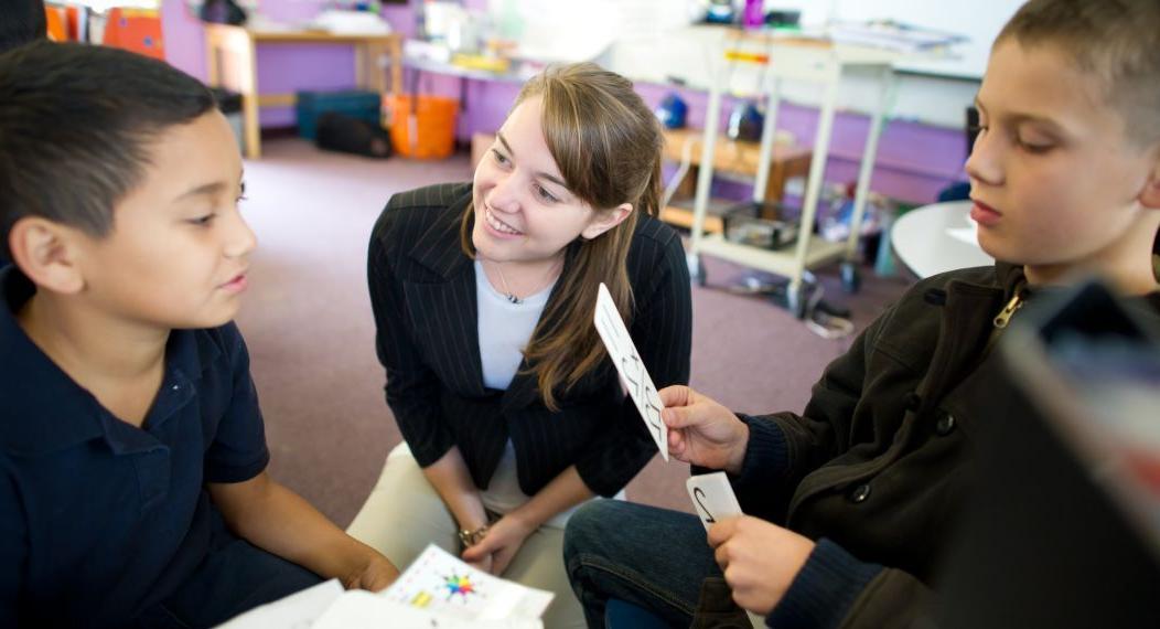 Benerd student teacher at school with children