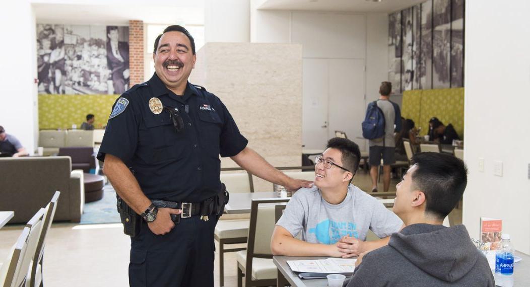 a public safety office talks to students