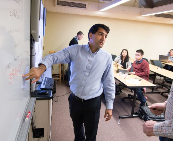 Professor lecturing in an engineering management class